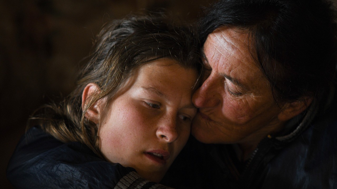 Mother holding her daughter